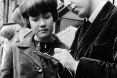 Paul McCartney is signing autograph on 10 February, 1963.