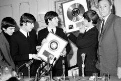 FEBRUARY 10 Allen Livingston, President of Capital Records presents the Beatles with Gold Record at the Hotel Plaza.