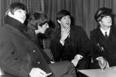 The Beatles waiting for their flight at London Airport on 10 February 1964