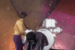 George Harrison lost his virginity while the other Beatles secretly watched. They cheered when he finished