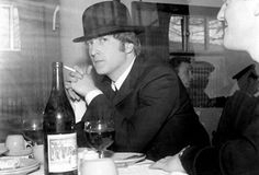 John Lennon with actor Norman Rossington on the set of A Hard Day's Night, 1964