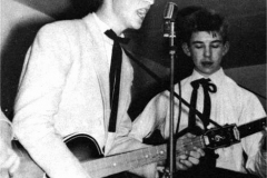 1957, November 23, John Lennon, Eric Griffiths of the Quarry Men, New Clubmoor Hall, Broadway, Liverpool.
