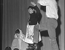 The Beatles perform one of their skits during The Beatles Christmas Show, January 1964.