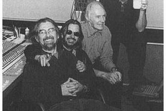 George Harrison, Richard Starkey, and Paul McCartney with Sir George Martin