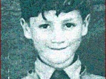 32- John Lennon as a young boy, while he was growing up in Liverpool, England