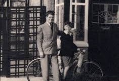 6-John (age 8), outside his childhood home with friend, Stanley Parkes.