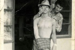 11- RINGO STARR poses provocatively in the late 1950s with a friend in Liverpool,