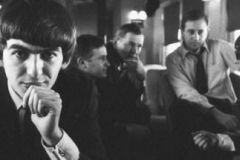 George Harrison and John Lennon with others, 11 February 1964 Photo