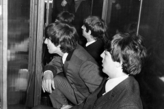 The Beatles on the train during the filming of 'A Hard Day's Night'
