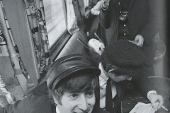 The Beatles on the train heading to Washington D.C. from New York City's Penn Station,