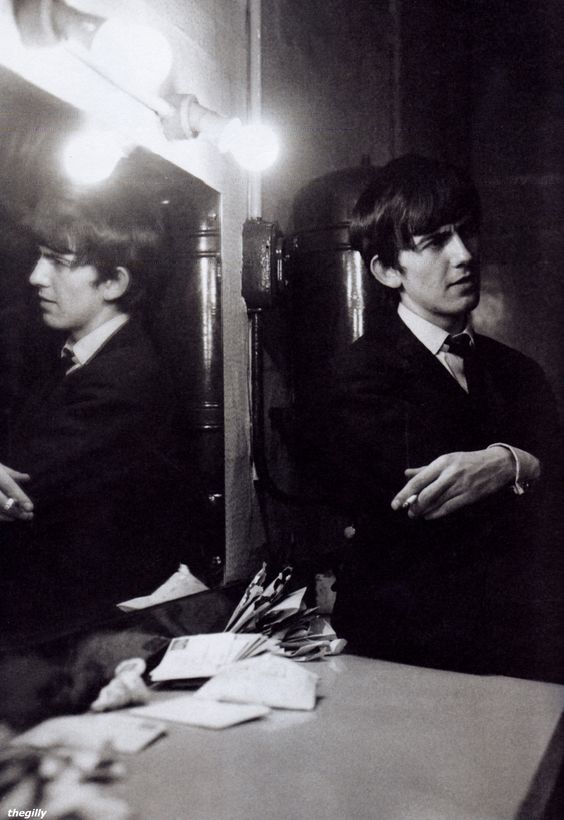 George Harrison photographed in his dressing room in East Ham by Jane Bown, November 9, 1963.
