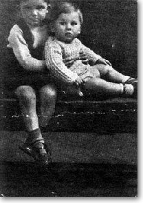 George Harrison (right) at the age of 14 months with his brother Peter.